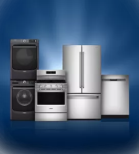 Maytag® appliances in a row with a light behind them